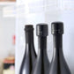 Vin-, öl- och champagneproppar förseglade med silikon